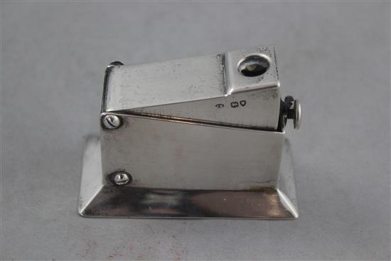 A late Victorian silver table cigar cutter, 3in.